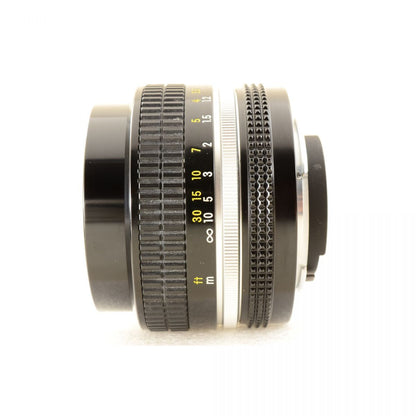 【中古】Nikon New NIKKOR 50mm f/1.4 非Ai 50mm f/1.4 単焦点 カメラレンズ 交換レンズ フード付 ニコン