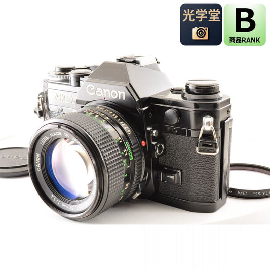 【中古】Canon AE-1 ブラック New FD 50mm f/1.4 フィルムカメラ レンズセット 一眼レフ キヤノン