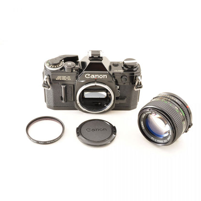 【中古】Canon AE-1 ブラック New FD 50mm f/1.4 フィルムカメラ レンズセット 一眼レフ キヤノン