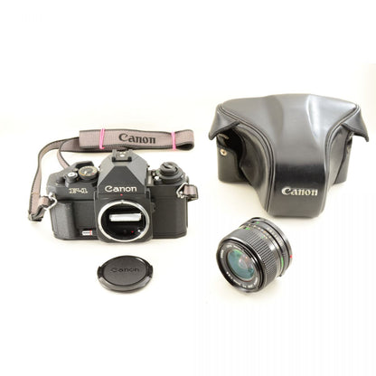 【中古】Canon New F-1 アイレベル 35mm 一眼レフフィルムカメラ + New FD 24mm f/2.8 広角 単焦点レンズ キャノン S/N: 121748