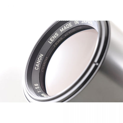 【中古】Canon AE-1 シルバー 35mm 一眼レフ フィルムカメラ + FD 100-200mm f/5.6 望遠ズームレンズ キャノンセット S/N: 1556941