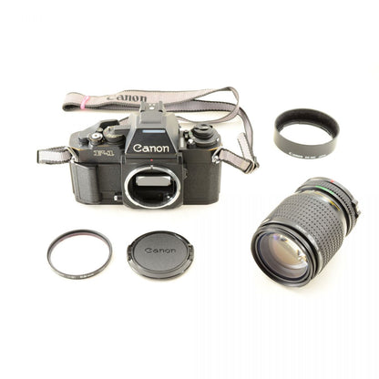【中古】Canon New F-1 アイレベル 35mm フィルムカメラ + New FD 35-105mm f/3.5-4.5 ズームレンズ キャノン S/N: 224918
