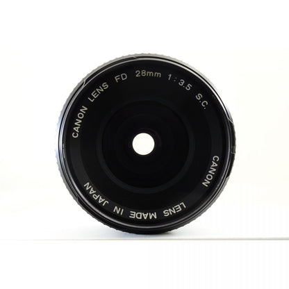 【中古】Canon New F-1 アイレベル フィルムカメラ ケース FD 28mm f/3.5 S.C. 単焦点 キヤノン セット S/N:172217